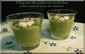 Huevos De Codorniz Trufados Sobre Cama De Crema De Calabacín
