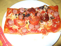 Pizza En Masa De Coca Con Tomate Natural
