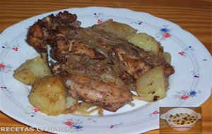 Conejo Al Ajillo Con Papas Y Cebolla  Al Horno