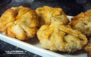 Saquitos De Secreto De Cerdo Al Curry Con Pasas Y Piñones
