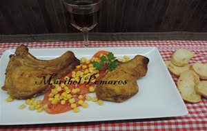 Chuletas De Cerdo Empanadas Con Pan Rallado De Queso, Ajo Y Perejil, Rellenas De Queso.
