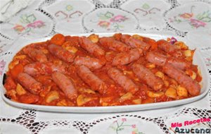 Salchichas Frescas Con Sidra Y Tomate.
