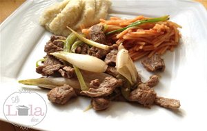 Bistecs En Fajitas Con Cebollín
