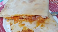 Pizza Calzone De Jamón Serrano, Queso Y Bacon
