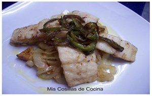 Bacalao Frito Con Patatas Cebolla Y Pimientos
