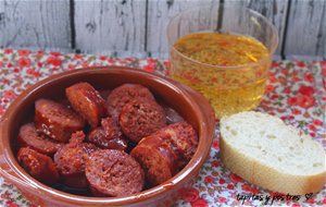 Chorizos A La Sidra.
