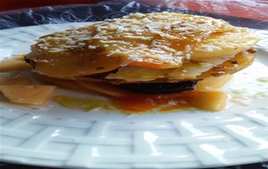 Timbal De Patata Glaseada  Con Queso Curado,persimón Y Morcilla  A La Vinagreta De Naranja
