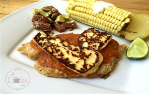 Pescado En Salsa De Tomate Con Panela Asada
