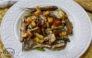 Boquerones Fritos Con Ajetes Y Tomates Secos/fried Anchoives With Young Garlics And Dried Tomatoes
