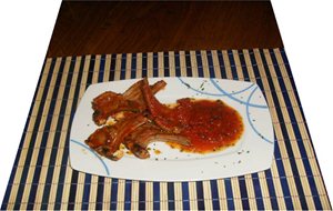 Chuletas De Cordero Lechal Con Tomate 
